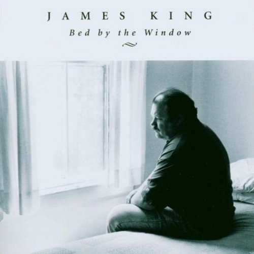James King Bed By The Window 