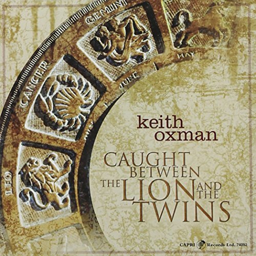 Keith Oxman/Caught Between The Lion & The