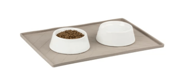 Two bowls on the messy mutts silicone food mat with metal sides 
