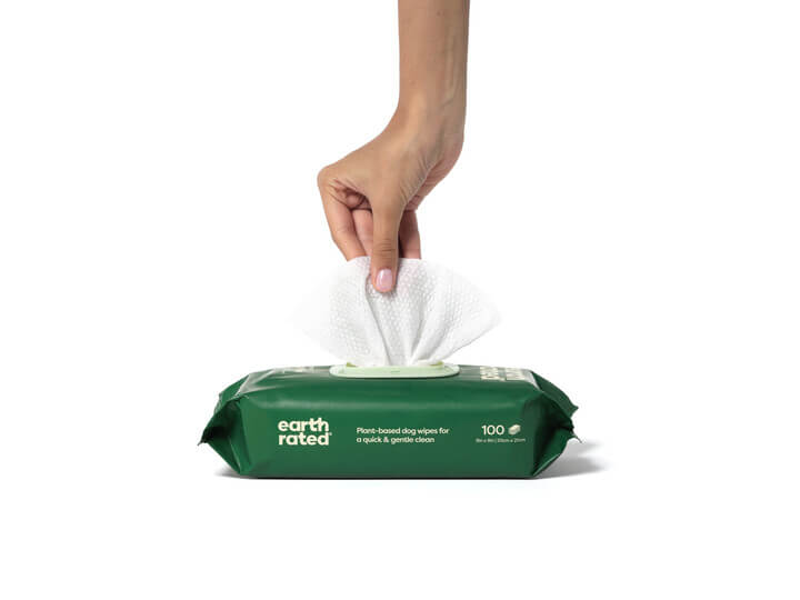 earth rated grooming wipes being pulled