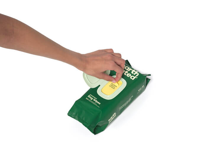 Earth Rated grooming wipes being opened