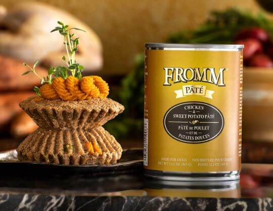 Fromm Chicken and Sweet Potato can next to savory ingredients